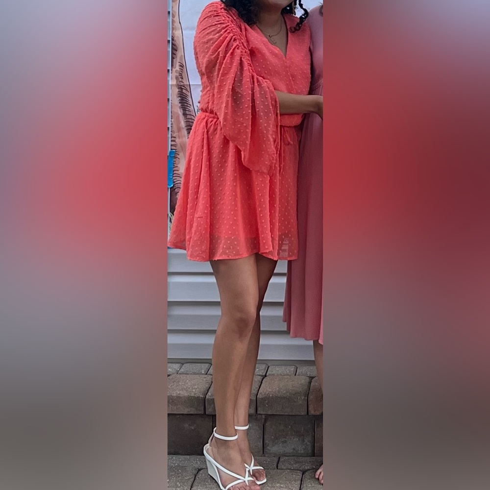 Elegant Coral Dress with Flowing Sleeves
